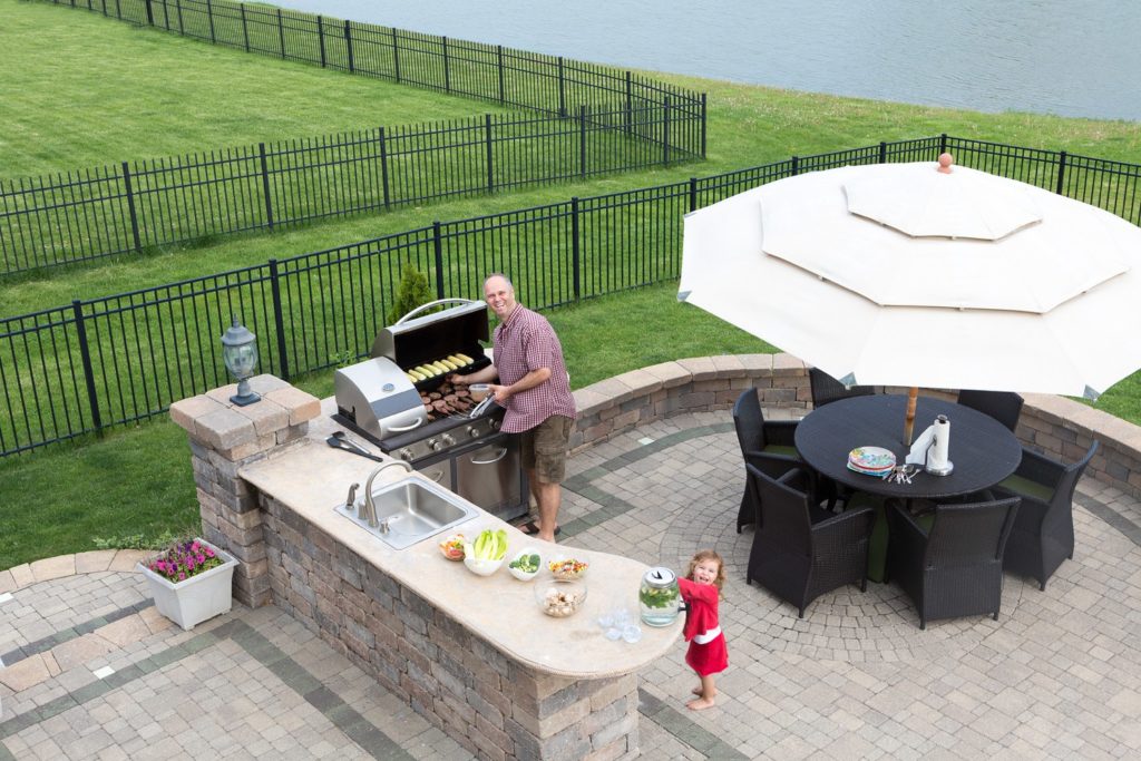 A beautifully designed outdoor kitchen in a Colorado backyard.