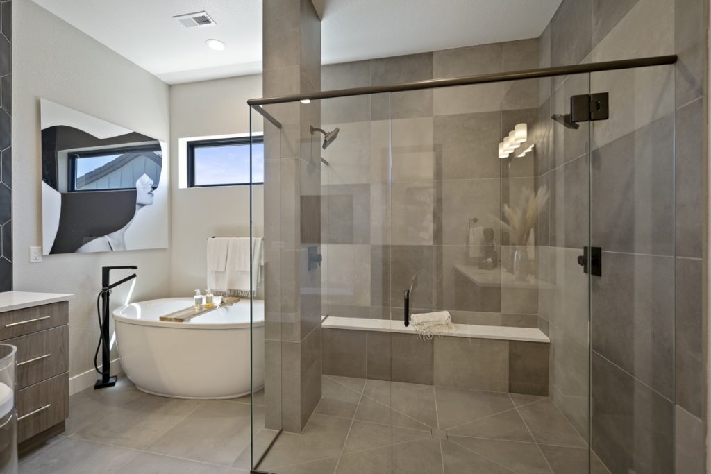 Bathroom remodel displaying family-friendly features like spacious layout, accessible fixtures, and stylish design