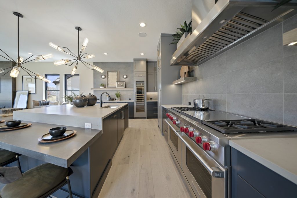 Stylish modern kitchen after a Kitchen Remodel in Colorado featuring updated cabinets, countertops, and bright contemporary finishes.