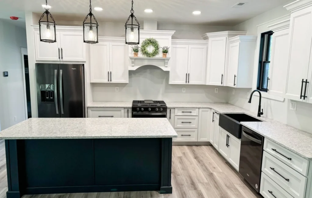 Close-up view of a clean, polished kitchen countertop made from durable countertop materials in a Colorado home.